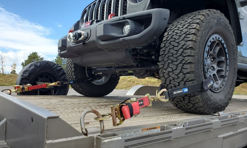 jeep secured to trailer